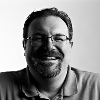 Portrait of Jamie Gergen in black and white.
